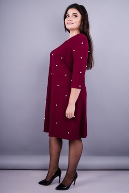 Un bel vestito per donne con forme magnifiche. Bordeaux.485131161 485131161 foto