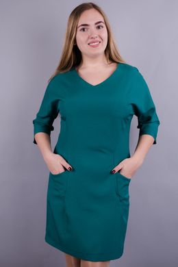 A fashionable dress of Plus sizes. Emerald.485130781 485130781 photo