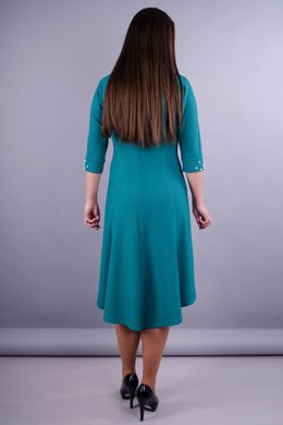שמלה מסוגננת לנשים בגדלי פלוס. טורקיז .485131238 485131238 צילום